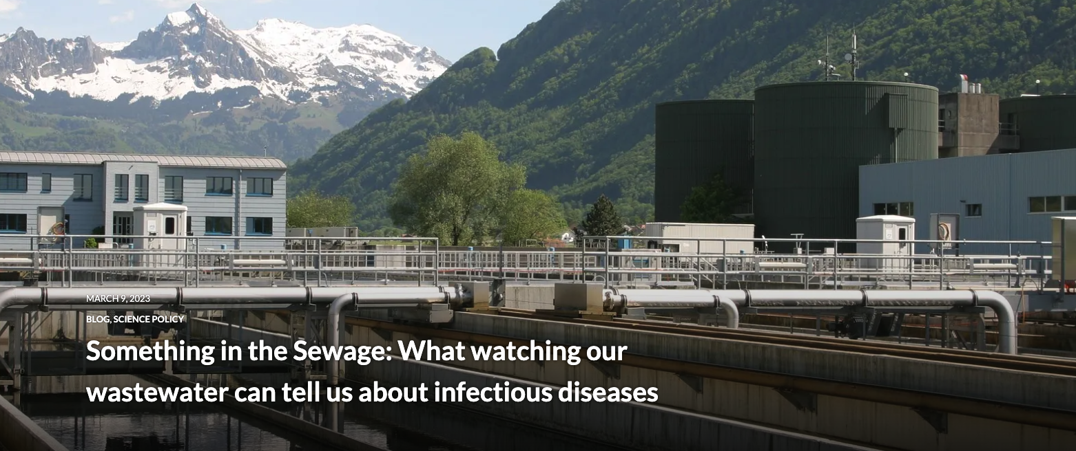 Picture of a sewage treatment plant over a waterway. Mountains in the background. Title 